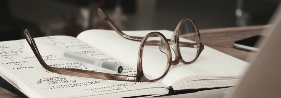 Glasses on notebook